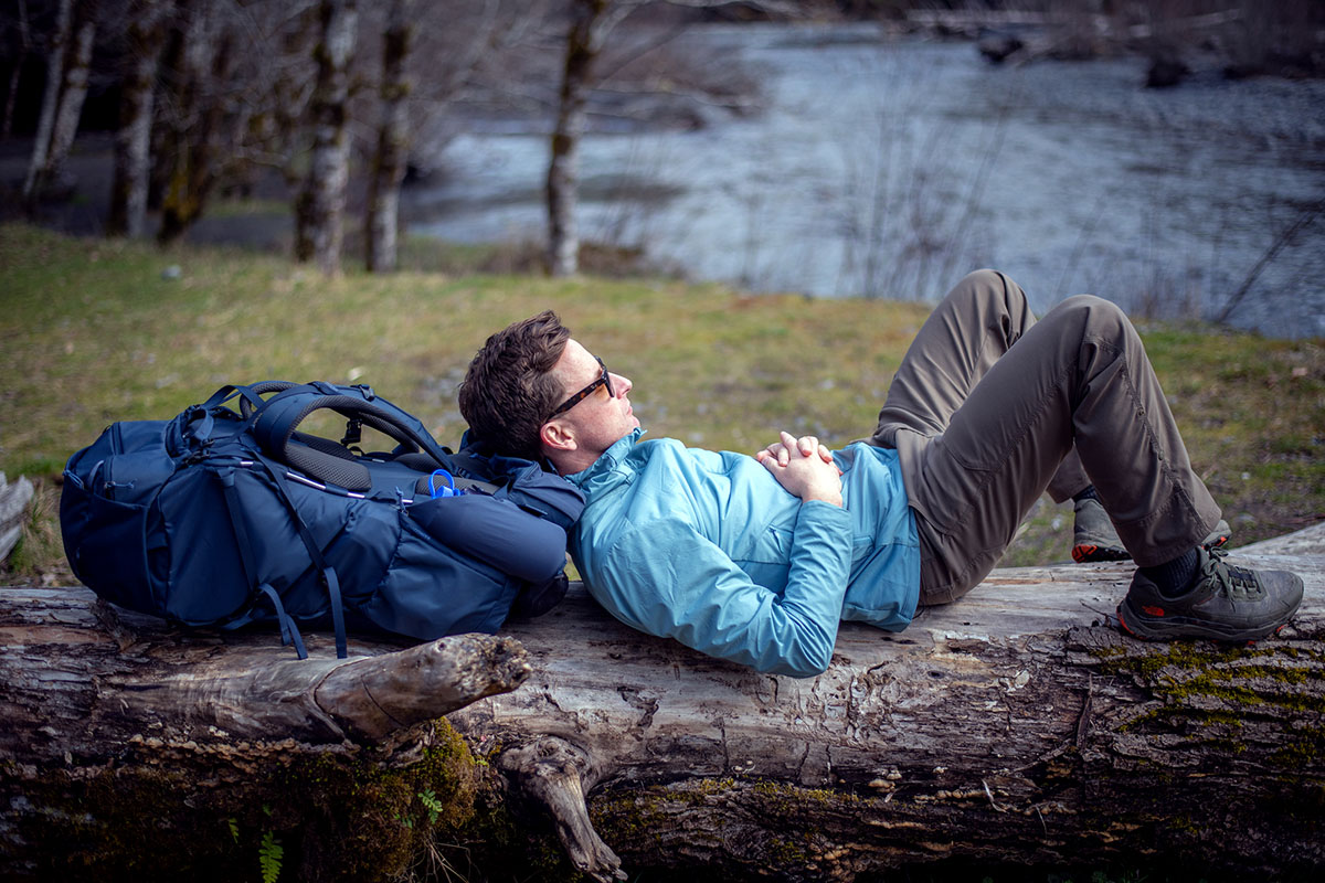 The North Face Vectiv Exploris hiking shoe (resting on log)